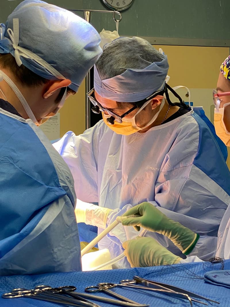 Surgeons performing operation